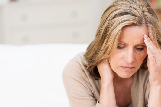 What causes menopausal dryness?